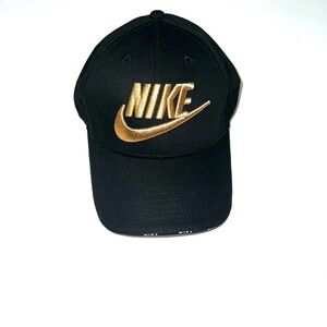 Nike adjustable hat with a gold embroidered Swoosh logo OS